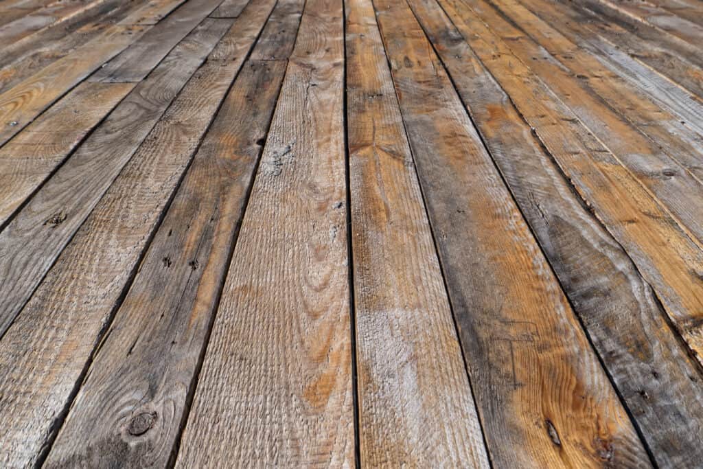 When to Refinish Hardwood Floors vs. When to Replace